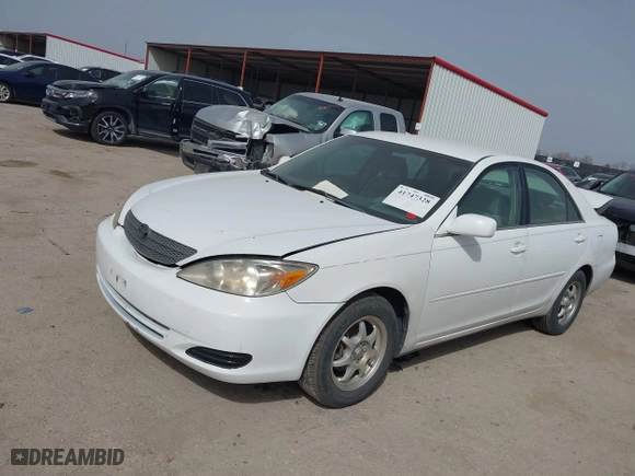2004 Toyota Camry LE with VIN 4T1BE30K24U336188, listed as a IAAI auction lot 41747328 with 338,564 mi miles. Bid and sale history available at carsss.com. Image 17.