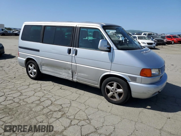 2002 Volkswagen EuroVan MV with VIN WV2MB470X2H068241, listed as a Copart auction lot 51183275 with 194,130 mi miles and Salvage Title. Bid and sale history available at DreamBid. Image 4.