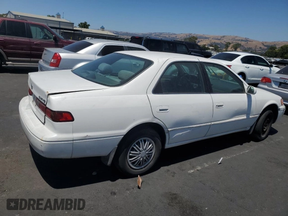1997 Toyota Camry LE with VIN JT2BG22K7V0005405, listed as a Copart auction lot 58988545 with 268,952 mi miles and Salvage title. Bid and sale history available at DreamBid. Image 3.