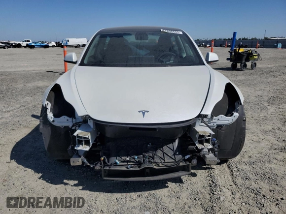 2023 Tesla Model 3 с VIN 5YJ3E1EAXPF541042, выставлен на аукционе Copart как лот 52898805 с пробегом 59 724 миль миль и Списание • Salvage title. История ставок и продаж доступна на DreamBid. Изображение 5.