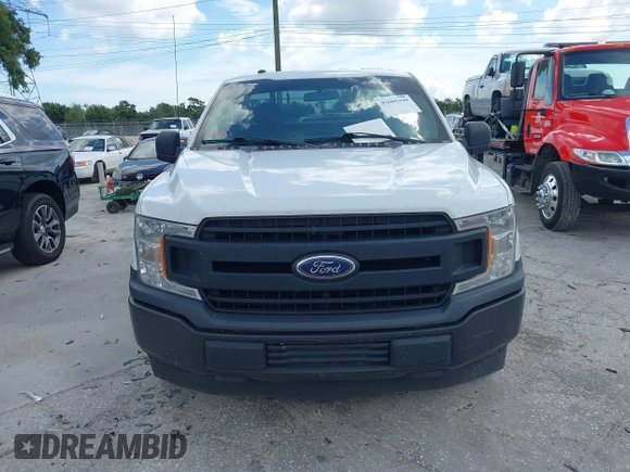 2018 Ford F-150 XL with VIN 1FTMF1CB0JFE21234, listed as a IAAI auction lot 42605399 with 243,035 mi miles and . Bid and sale history available at DreamBid. Image 12.