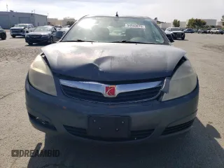 2009 Saturn Aura XE with VIN 1G8ZS57B59F211561, listed as a Copart auction lot 54940875 with 139,479 mi miles and Salvage Title. Bid and sale history available at DreamBid. Image 5.