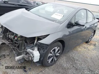 2017 Toyota Prius Plus with VIN JTDKARFP7H3054775, listed as a IAAI auction lot 42023670 with 80,759 mi miles and . Bid and sale history available at DreamBid. Image 2.