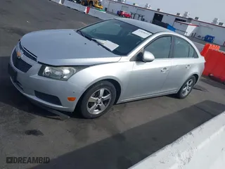 2011 Chevrolet Cruze LT w/1FL with VIN 1G1PE5S91B7203605, listed as a IAAI auction lot 41858514 with 149,603 mi miles. Bid and sale history available at carsss.com. Image 2.