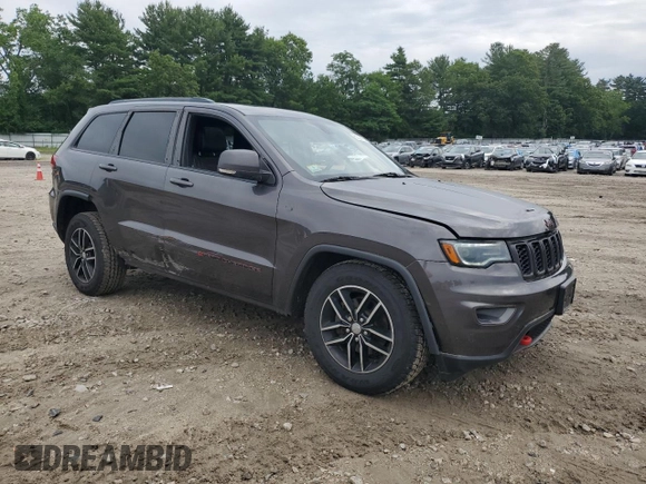 2018 Jeep Grand Cherokee Trailhawk with VIN 1C4RJFLG1JC264781, listed as a Copart auction lot 61524135 with 82,786 mi miles and Salvage title. Bid and sale history available at DreamBid. Image 4.