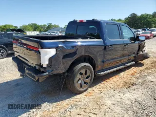 2024 Ford F-150 Lightning Lariat z VIN 1FT6W5L7XRWG09914, wystawiony jako Copart lot #52040985 z przebiegiem 2 588 mil mil oraz Szkoda całkowita • Salvage title. Historia ofert i sprzedaży dostępna na DreamBid. Obrazek 3.