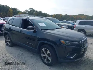 2019 Jeep Cherokee Limited with VIN 1C4PJMDX2KD235618, listed as a IAAI auction lot 40672263 with 82,117 mi miles and . Bid and sale history available at carsss.com. Image 13.