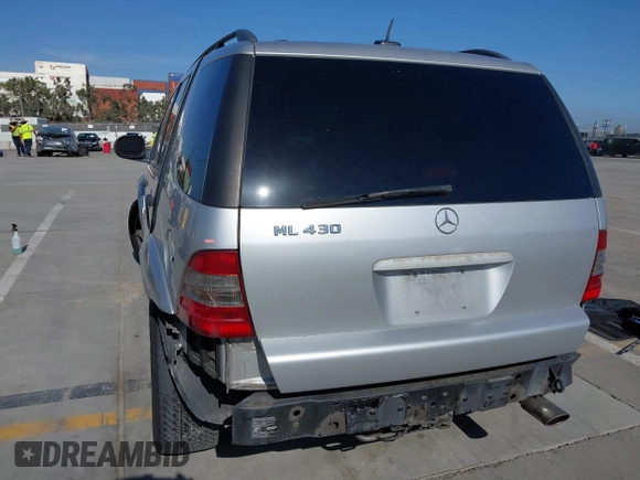 2001 Mercedes-Benz M 320/430/500 z VIN 4JGAB72E21A253005, wystawiony jako IAAI lot #42337921 z przebiegiem 171 529 mil mil oraz . Historia ofert i sprzedaży dostępna na DreamBid. Obrazek 6.