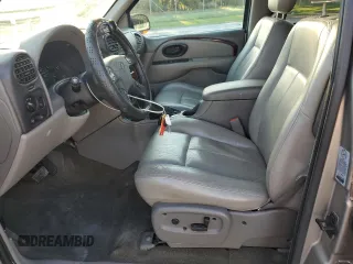 2002 Oldsmobile Bravada z VIN 1GHDT13S022195272, wystawiony jako Copart lot #77302614 z przebiegiem 115 800 mil mil oraz Szkody całkowita. Historia ofert i sprzedaży dostępna na DreamBid. Obrazek 7.