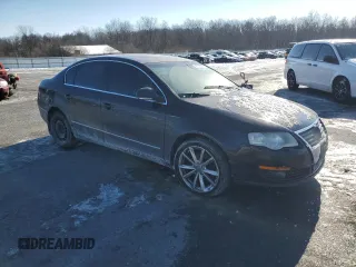 2009 Volkswagen Passat Komfort z VIN WVWJK73C79P056163, wystawiony jako Copart lot #42095525 z przebiegiem 132 709 mil mil oraz Szkoda całkowita • Salvage title. Historia ofert i sprzedaży dostępna na DreamBid. Obrazek 4.