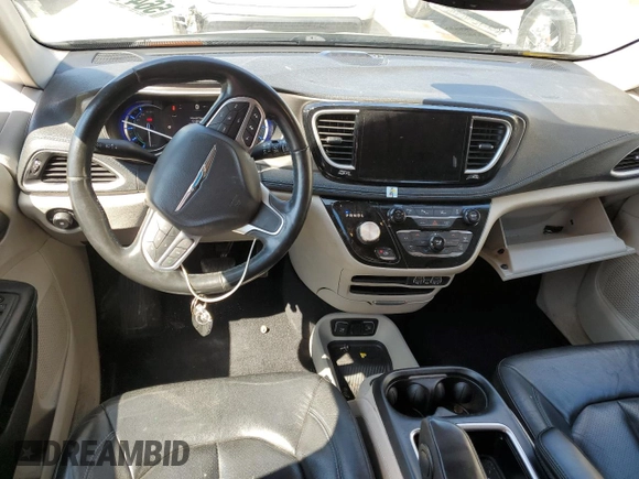 2021 Chrysler Pacifica Hybrid Touring L with VIN 2C4RC1L72MR599413, listed as a Copart auction lot 56419875 with 108,986 mi miles and Salvage title. Bid and sale history available at DreamBid. Image 8.