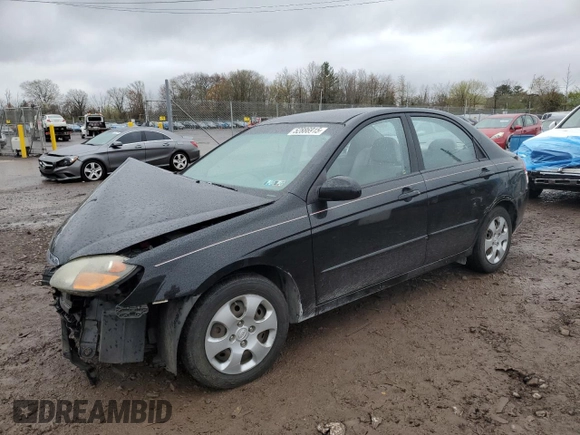 2009 Kia Spectra EX with VIN KNAFE222495648220, listed as a Copart auction lot 52886915 with 146,417 mi miles and Salvage title. Bid and sale history available at DreamBid. Image 1.