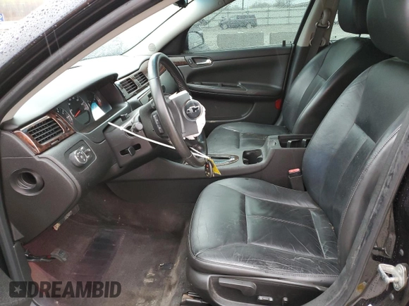 2012 Chevrolet Impala LTZ with VIN 2G1WC5E33C1132124, listed as a Copart auction lot 51181215 with 147,500 mi miles and Salvage Title. Bid and sale history available at DreamBid. Image 7.
