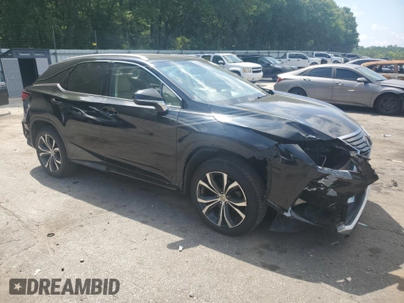 2016 Lexus RX 350 with VIN 2T2ZZMCAXGC005341, listed as a Copart auction lot 56499985 with 193,354 mi miles and Salvage title. Bid and sale history available at DreamBid. Image 4.