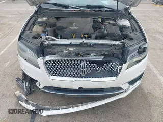 2017 Lincoln MKZ Reserve z VIN 3LN6L5EC2HR613827, wystawiony jako IAAI lot #41800613 z przebiegiem 199 097 mil mil oraz . Historia ofert i sprzedaży dostępna na DreamBid. Obrazek 10.