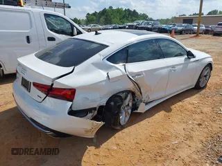 2023 Audi A5 Sportback Premium z VIN WAUABCF57PA020461, wystawiony jako IAAI lot #42230307 z przebiegiem 28 983 mil mil oraz . Historia ofert i sprzedaży dostępna na DreamBid. Obrazek 4.