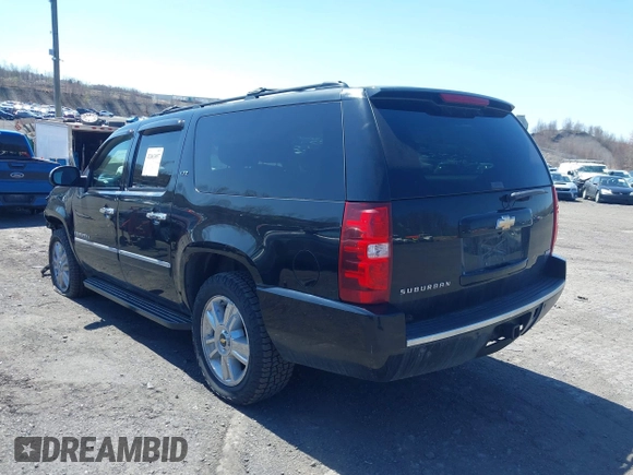 2009 Chevrolet Suburban LTZ with VIN 1GNFK36399J124158, listed as a IAAI auction lot 42063097 with 204,856 mi miles. Bid and sale history available at carsss.com. Image 3.