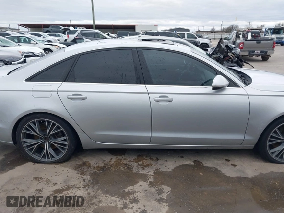 2015 Audi A6 Premium Plus z VIN WAUGFAFC8FN032627, wystawiony jako IAAI lot #41270302 z przebiegiem 82 104 mil mil oraz . Historia ofert i sprzedaży dostępna na DreamBid. Obrazek 13.