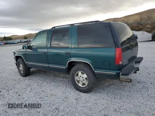 1996 GMC Yukon with VIN 1GKEK13R6TJ747606, listed as a Copart auction lot 80763434 with 308,837 mi miles and Salvage Title. Bid and sale history available at carsss.com. Image 2.