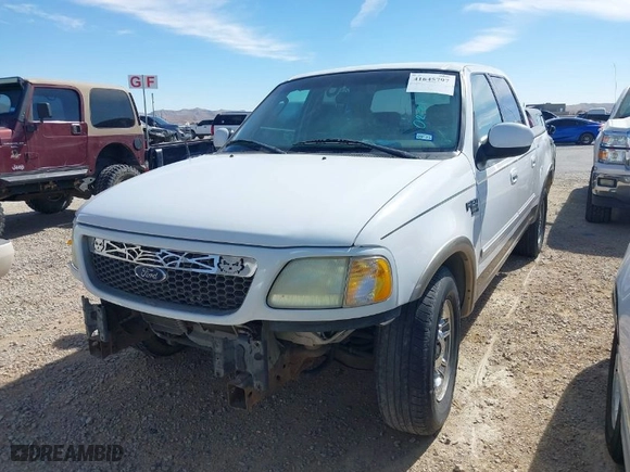 2002 Ford F-150 XLT with VIN 1FTRW07L92KC55405, listed as a IAAI auction lot 41645797 with 198,211 mi miles. Bid and sale history available at carsss.com. Image 2.