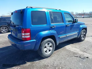 2009 Jeep Liberty Sport with VIN 1J8GN28K69W533457, listed as a IAAI auction lot 41831960 with 185,403 mi miles. Bid and sale history available at carsss.com. Image 4.