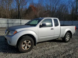 2013 Nissan Frontier SV z VIN 1N6AD0CW0DN710448, wystawiony jako Copart lot #80892564 z przebiegiem 251 089 mil mil oraz Czysty tytuł • Clean title. Historia ofert i sprzedaży dostępna na DreamBid. Obrazek 1.