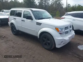 2010 Dodge Nitro SXT with VIN 1D4PU5GK7AW138708, listed as a IAAI auction lot 41440363 with 244,810 mi miles and . Bid and sale history available at DreamBid. Image 1.