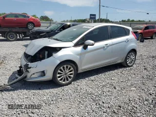2014 Ford Fiesta SE z VIN 3FADP4EJ9EM177114, wystawiony jako Copart lot #53564915 z przebiegiem 119 483 mil mil oraz Szkoda całkowita • Salvage title. Historia ofert i sprzedaży dostępna na DreamBid. Obrazek 1.