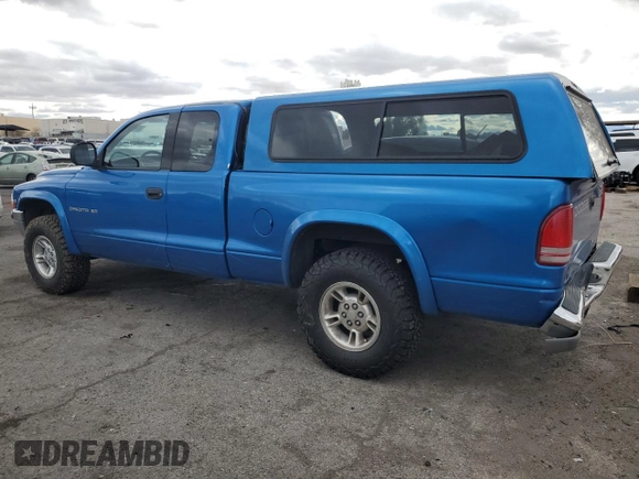 1999 Dodge Dakota SLT with VIN 1B7GG22Y7XS166815, listed as a Copart auction lot 48402125 with 176,458 mi miles and Salvage Title. Bid and sale history available at DreamBid. Image 2.