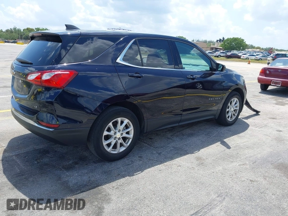 2020 Chevrolet Equinox LT with VIN 3GNAXJEV5LS592266, listed as a IAAI auction lot 41924328 with 61,574 mi miles and . Bid and sale history available at DreamBid. Image 4.
