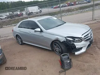 2014 Mercedes-Benz E-Class E 350 Luxury with VIN WDDHF8JB7EA955465, listed as a IAAI auction lot 39294655 with 130,952 mi miles. Bid and sale history available at carsss.com. Image 1.