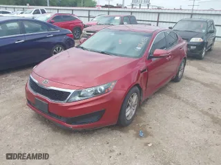 2011 Kia Optima LX with VIN KNAGM4A79B5057807, listed as a IAAI auction lot 42086984 with 133,261 mi miles. Bid and sale history available at carsss.com. Image 2.