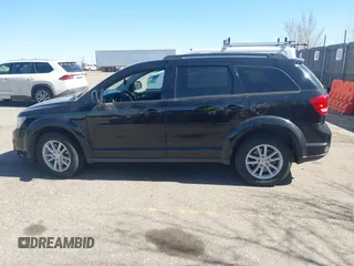 2016 Dodge Journey SXT with VIN 3C4PDDBG3GT215910, listed as a IAAI auction lot 41798779 with 165,505 mi miles. Bid and sale history available at carsss.com. Image 14.