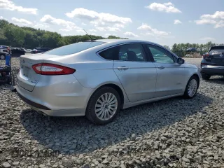 2013 Ford Fusion SE Hybrid with VIN 3FA6P0LU9DR217546, listed as a Copart auction lot 66597775 with Not provided miles and Clean title. Bid and sale history available at DreamBid. Image 3.
