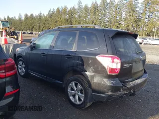 2014 Subaru Forester 2.5i Touring with VIN JF2SJAMC7EH406674, listed as a IAAI auction lot 41958178 with 190,866 mi miles. Bid and sale history available at carsss.com. Image 3.