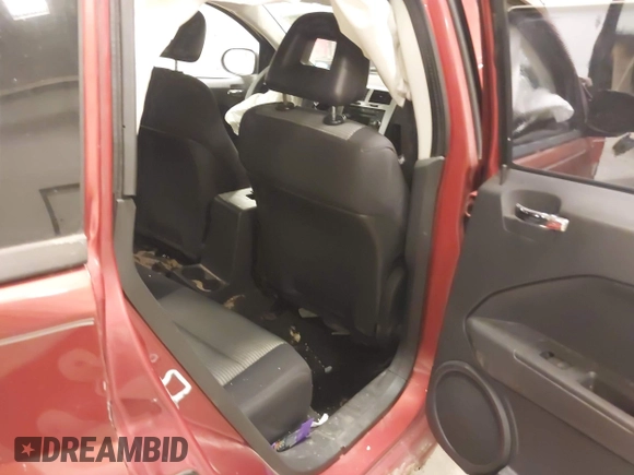 2009 Dodge Caliber SXT with VIN 1B3HB48A59D168273, listed as a IAAI auction lot 41988835 with 200,125 mi miles and . Bid and sale history available at DreamBid. Image 8.