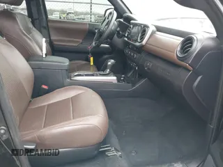 2018 Toyota Tacoma SR with VIN 3TMGZ5AN5JM159932, listed as a IAAI auction lot 41731655 with 138,780 mi miles. Bid and sale history available at carsss.com. Image 5.