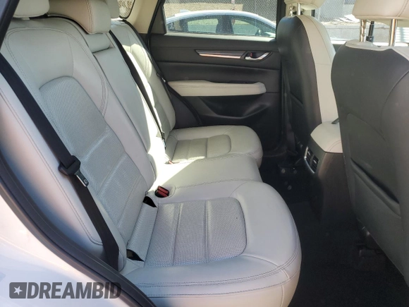 2019 Mazda CX-5 Grand Touring with VIN JM3KFADM4K1674408, listed as a Copart auction lot 47684015 with 77,554 mi miles and Salvage Title. Bid and sale history available at carsss.com. Image 12.