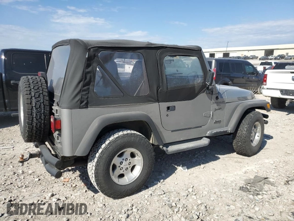 2000 Jeep Wrangler Sport with VIN 1J4FA49S4YP789348, listed as a Copart auction lot 50521365 with 0 mi miles and Salvage Title. Bid and sale history available at carsss.com. Image 3.
