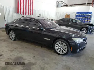 2011 BMW 7 Series with VIN WBAKX6C50BC197118, listed as a Copart auction lot 73686234 with 166,393 mi miles and Clean title. Bid and sale history available at DreamBid. Image 4.