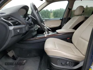 2012 BMW X5 35i с VIN 5UXZV4C5XCL749123, выставлен на аукционе Copart как лот 65259585 с пробегом 124 193 миль миль и Чистый • Clean title. История ставок и продаж доступна на DreamBid. Изображение 7.