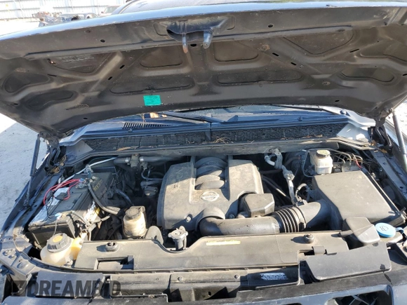 2012 Nissan Titan SV with VIN 1N6BA0EC0CN316317, listed as a Copart auction lot 57576905 with 113,323 mi miles and Salvage title. Bid and sale history available at DreamBid. Image 11.