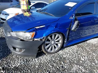 2011 Mitsubishi Lancer ES with VIN JA32U2FU8BU042901, listed as a IAAI auction lot 41450601 with 161,129 mi miles. Bid and sale history available at carsss.com. Image 6.