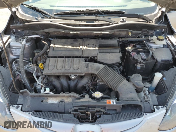 2011 Mazda 2 Sport z VIN JM1DE1HY1B0113087, wystawiony jako Copart lot #60428565 z przebiegiem 57 163 mil mil oraz Szkoda całkowita • Salvage title. Historia ofert i sprzedaży dostępna na DreamBid. Obrazek 12.