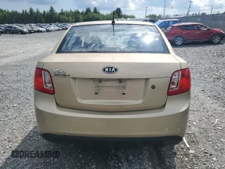 2011 Kia Rio with VIN KNADH4B30B6712241, listed as a Copart auction lot 61301184 with 159,902 mi miles and Salvage Title. Bid and sale history available at DreamBid. Image 6.