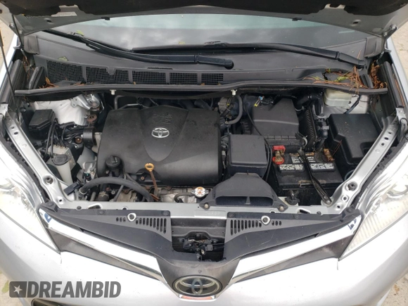 2019 Toyota Sienna LE with VIN 5TDJZ3DC6KS210862, listed as a Copart auction lot 73302064 with 113,768 mi miles and Salvage Title. Bid and sale history available at carsss.com. Image 13.