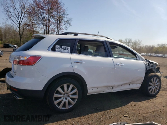 2010 Mazda CX-9 Grand Touring z VIN JM3TB3MV4A0215694, wystawiony jako Copart lot #54254805 z przebiegiem 168 263 mil mil oraz Szkoda całkowita • Salvage title. Historia ofert i sprzedaży dostępna na DreamBid. Obrazek 3.