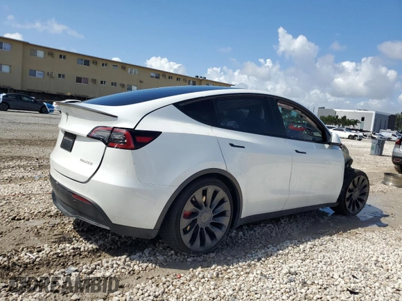 2023 Tesla Model Y Performance with VIN 7SAYGDEF0PF832570, listed as a Copart auction lot 51141415 with Not Provided miles and Non Repairable. Bid and sale history available at DreamBid. Image 3.