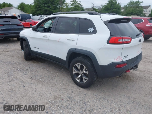 2014 Jeep Cherokee Trailhawk z VIN 1C4PJMBS4EW210719, wystawiony jako IAAI lot #42461733 z przebiegiem 134 096 mil mil oraz . Historia ofert i sprzedaży dostępna na DreamBid. Obrazek 3.