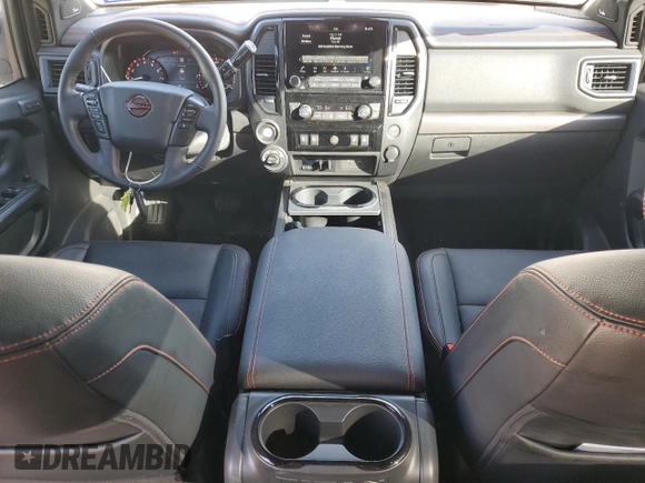 2023 Nissan Titan SV z VIN 1N6AA1ED7PN118575, wystawiony jako Copart lot #77127554 z przebiegiem 16 630 mil mil oraz Szkoda całkowita • Salvage title. Historia ofert i sprzedaży dostępna na DreamBid. Obrazek 8.